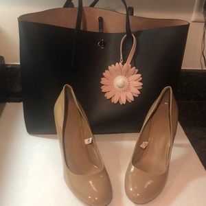 Beige or tan sexy high heel shoes.  size 9